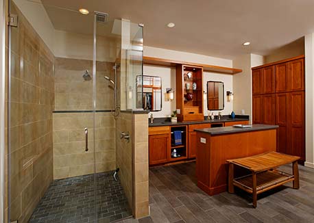 remodeled bathroom has bamboo cabinetry